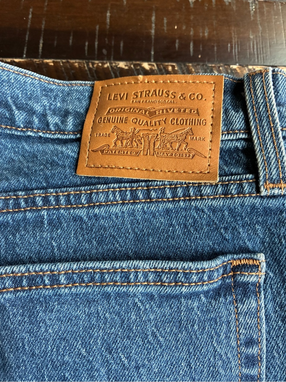 Levi's Women's Straight Leg Jeans in Blue with Tan Patch
